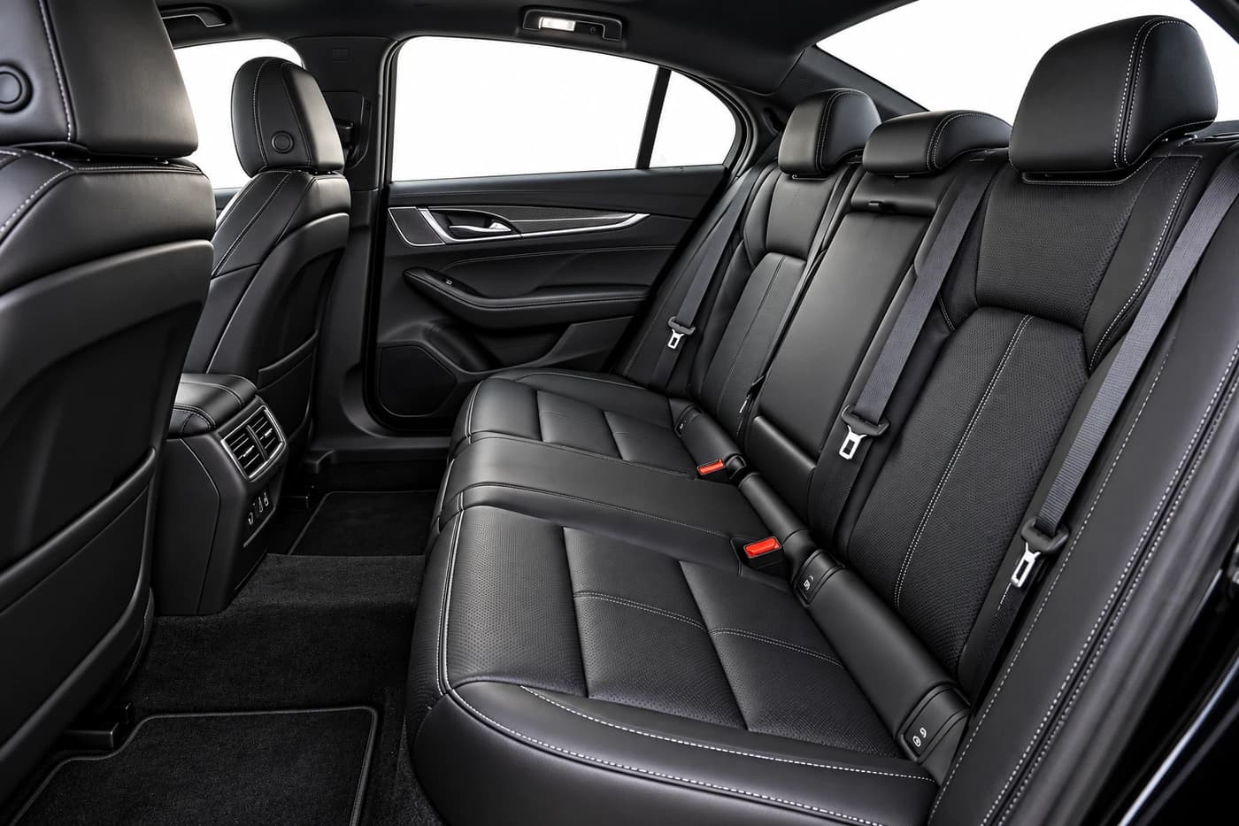 Cadillac CT5 rear bench seat in perforated black leather with contrast stitching.
