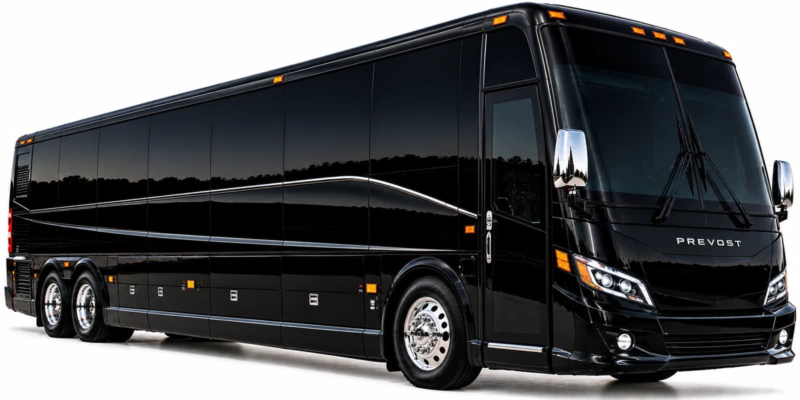A black Prevost fullsize bus is photographed from a front three-quarter angle showing large windows and chrome mirrors.